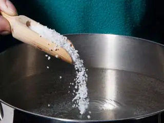 add salt in warm water